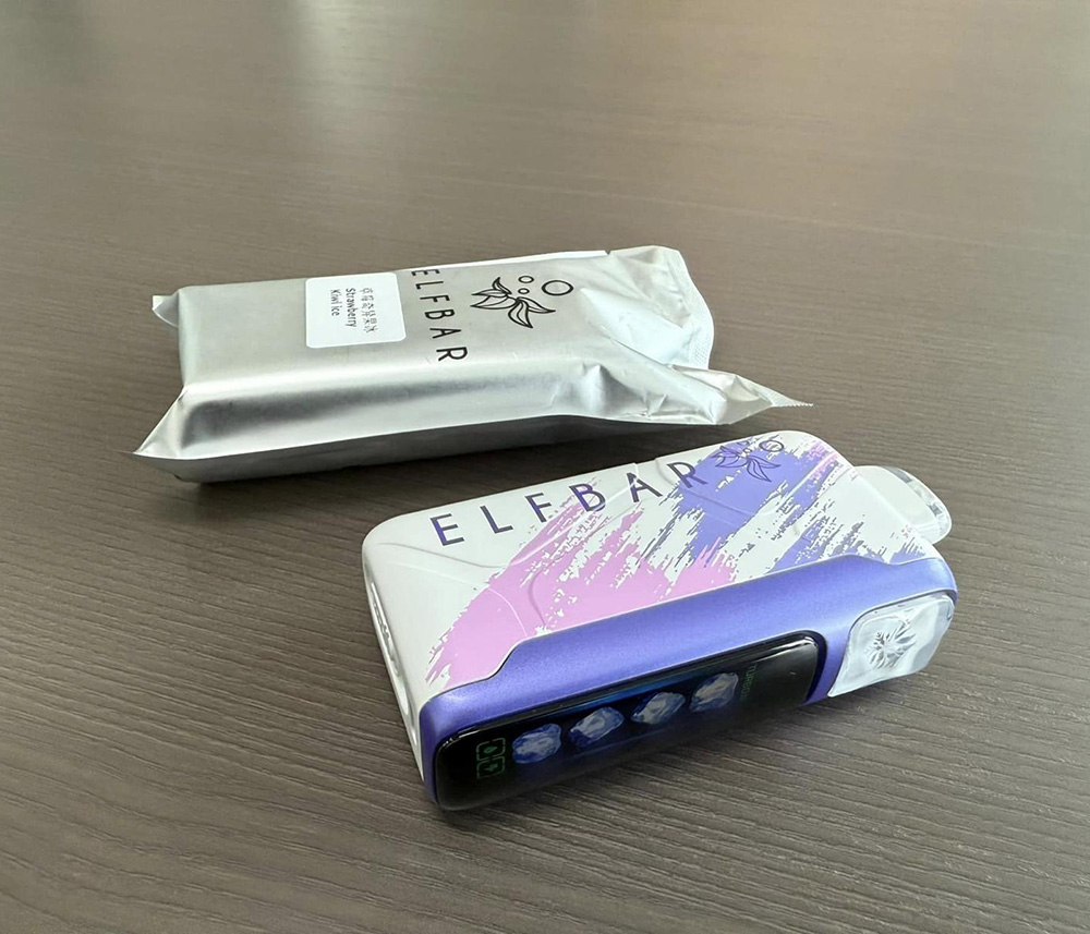 a small package next to a small device